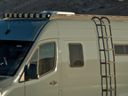 Sprinter High Roof Strata Side Ladder - Out There Vans, LLC