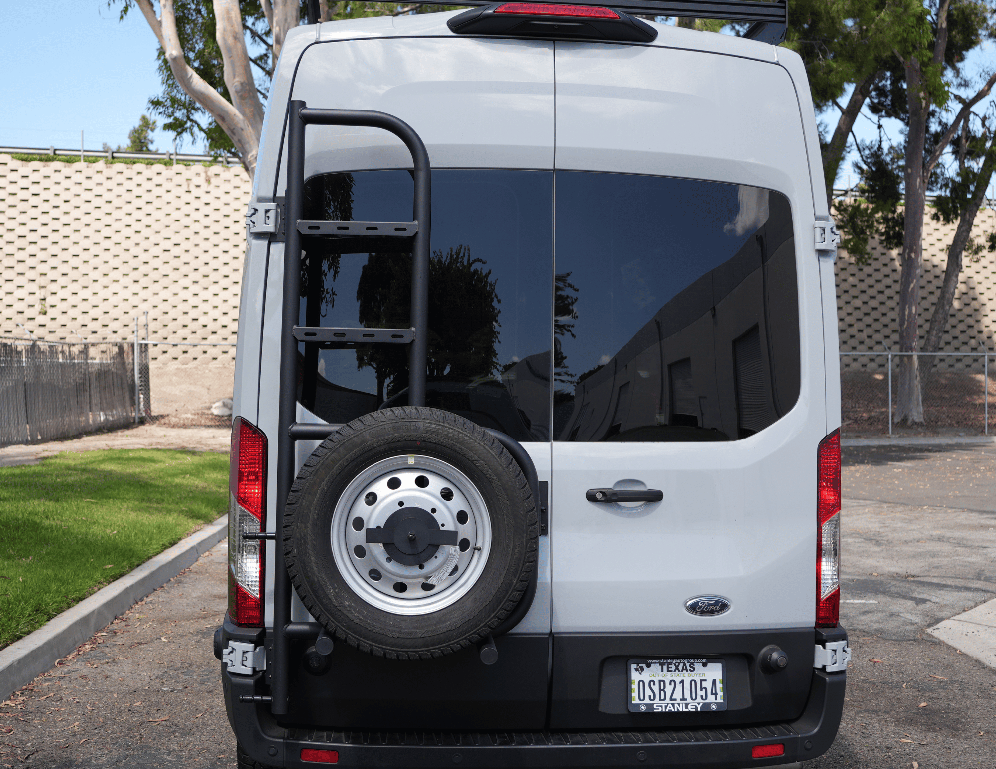 Transit Rear Tire Carrier Ladder - Out There Vans, LLC