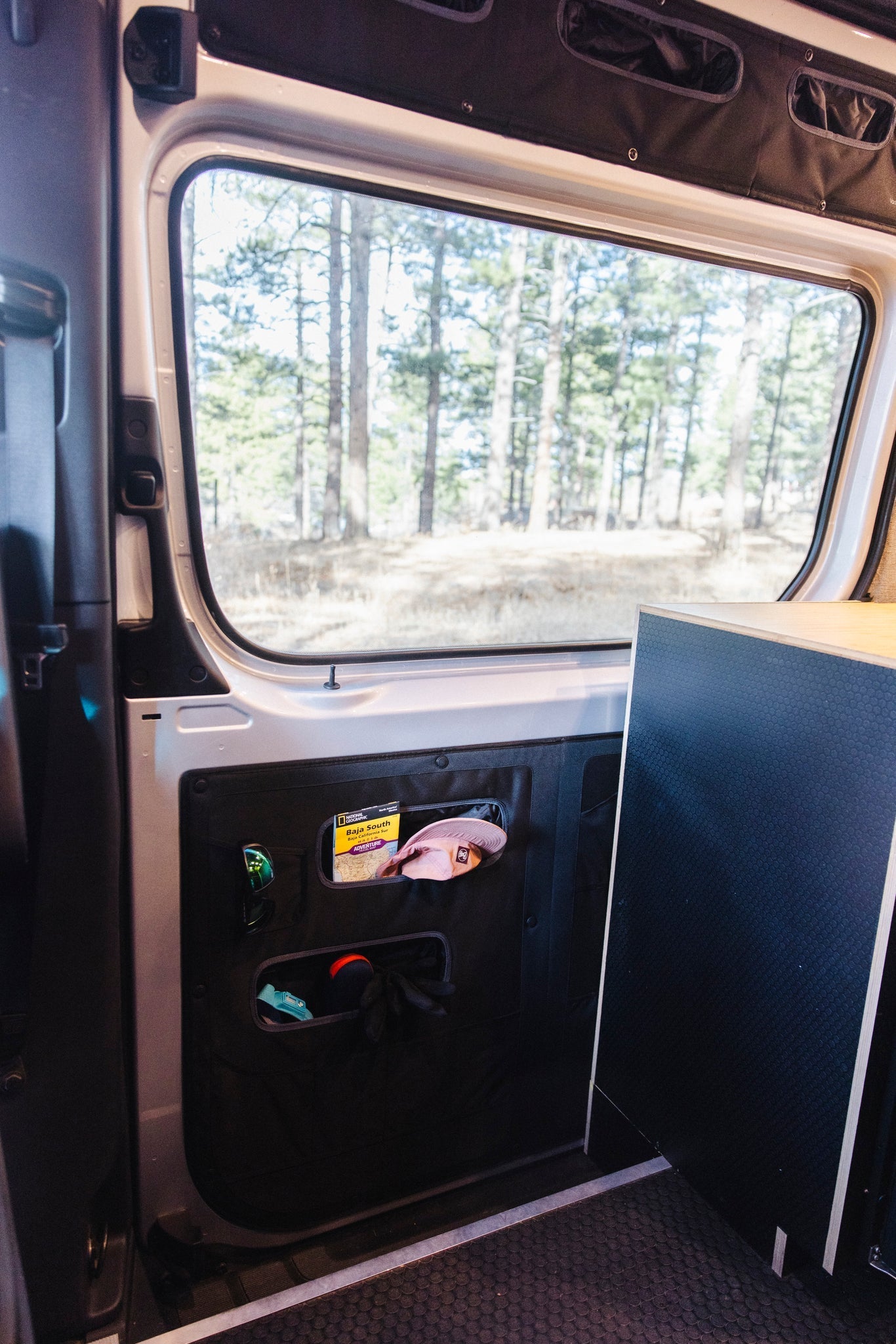 VanEssential Mercedes Sprinter Lower Sliding Door Storage Panel - Out There Vans, LLC