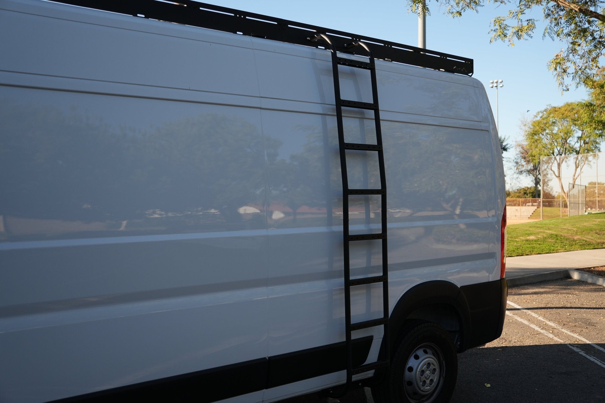 White Top Adventures ProMaster High Roof Side Ladder - Out There Vans, LLC